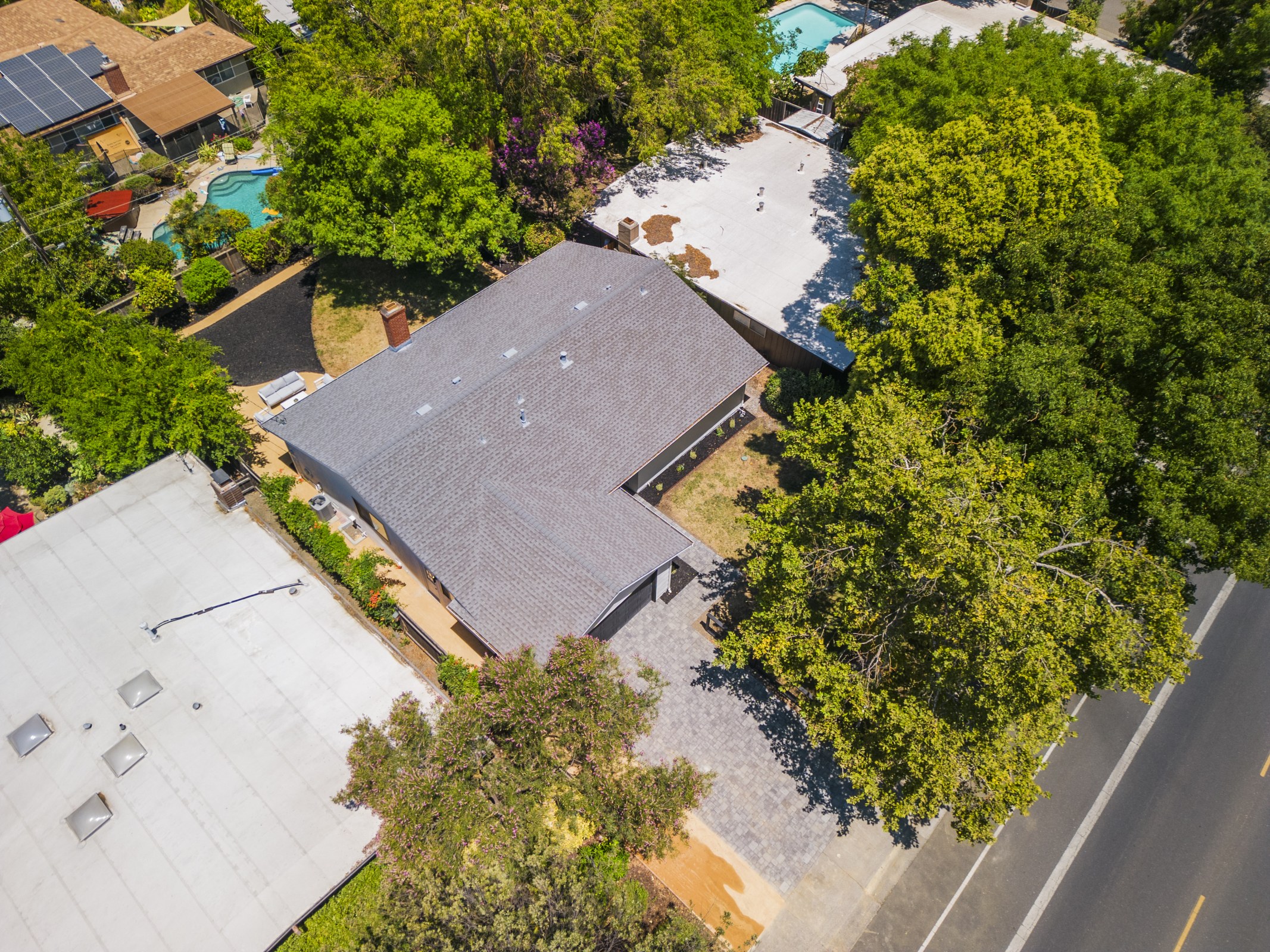 Aerial view of the home and surrounding neighborhood
