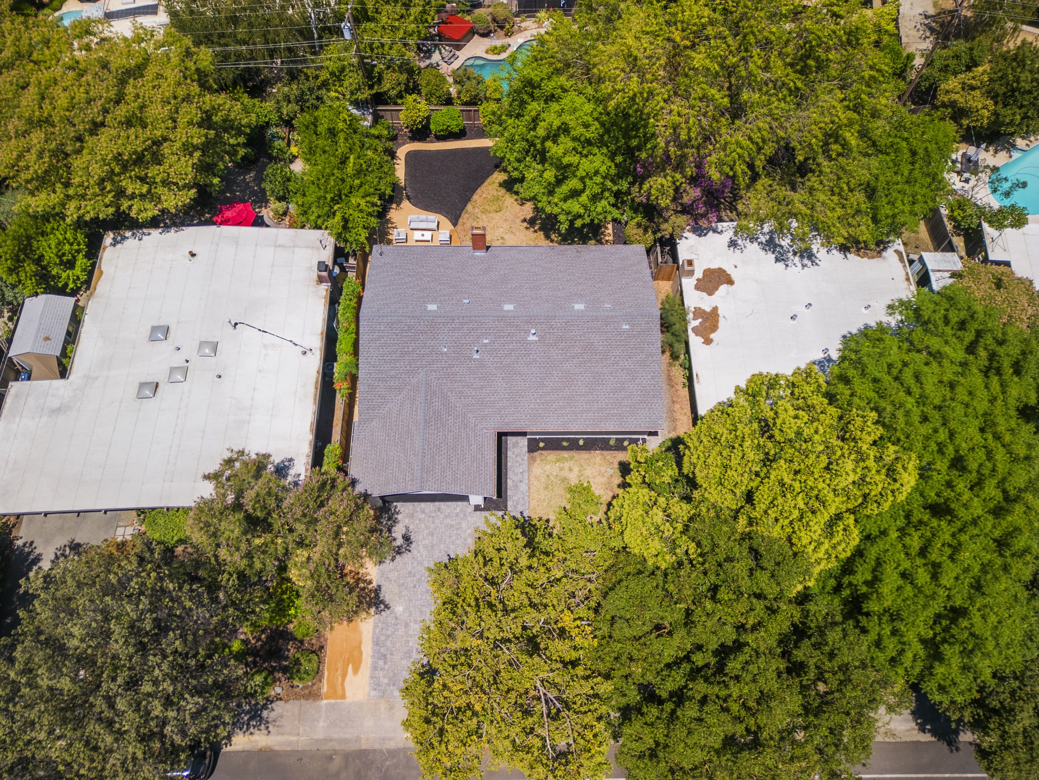 Aerial view of the home and surrounding neighborhood