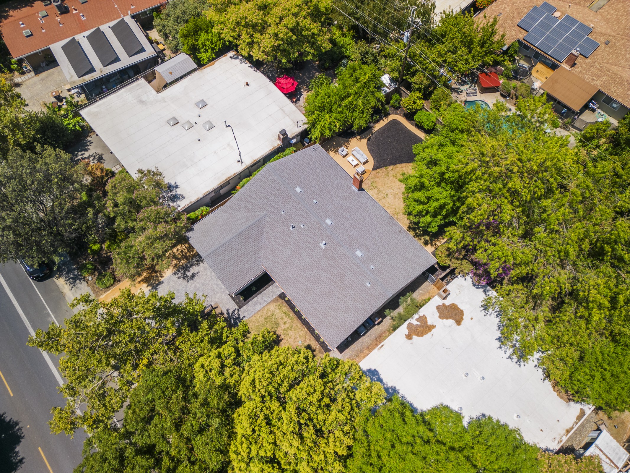 Aerial view of the home and surrounding neighborhood