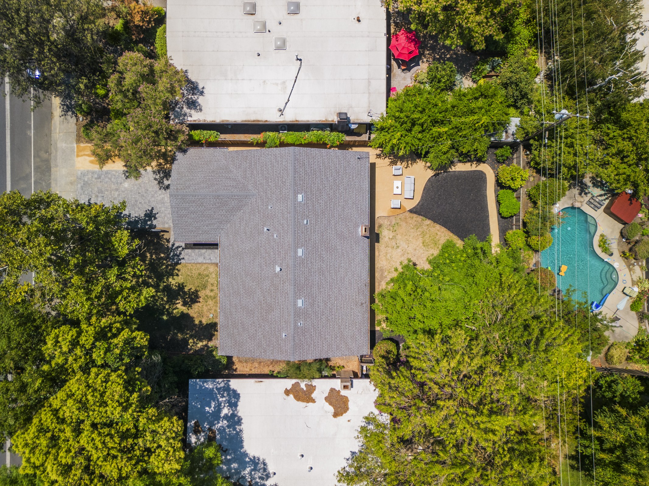Aerial view of the home and surrounding neighborhood