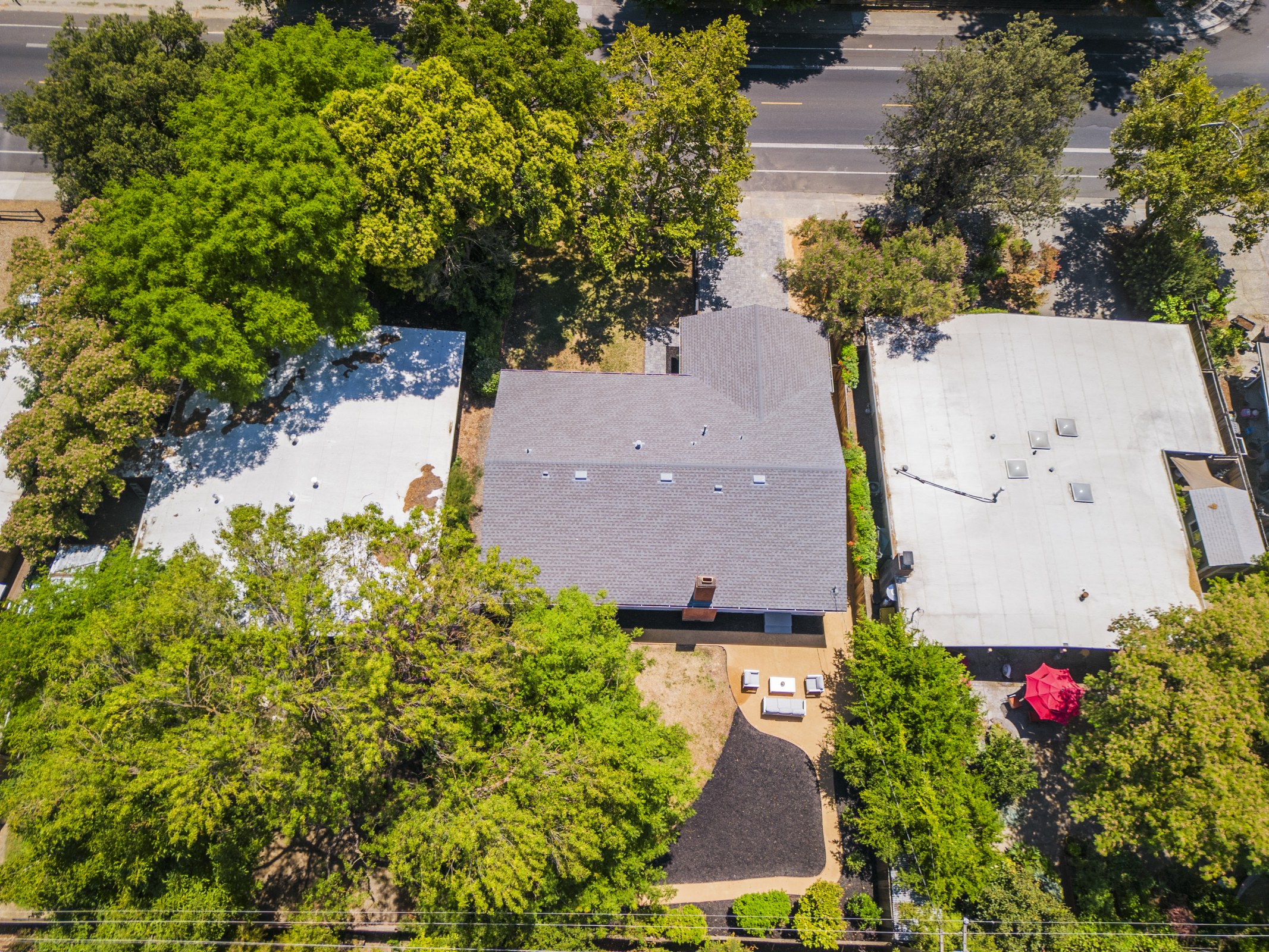 Aerial view of the home and surrounding neighborhood