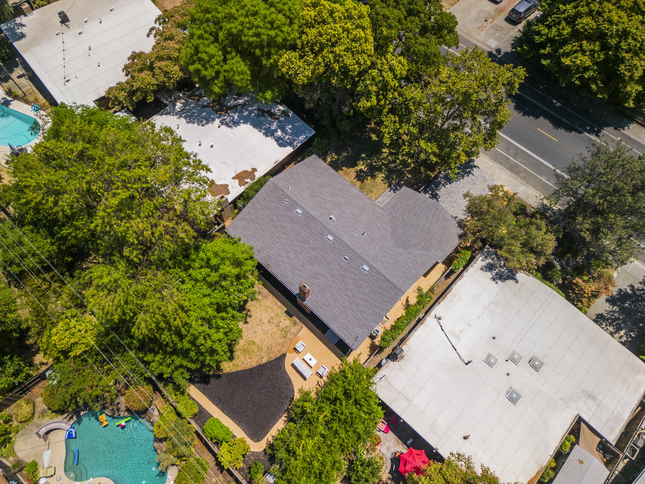 Aerial view of the home and surrounding neighborhood