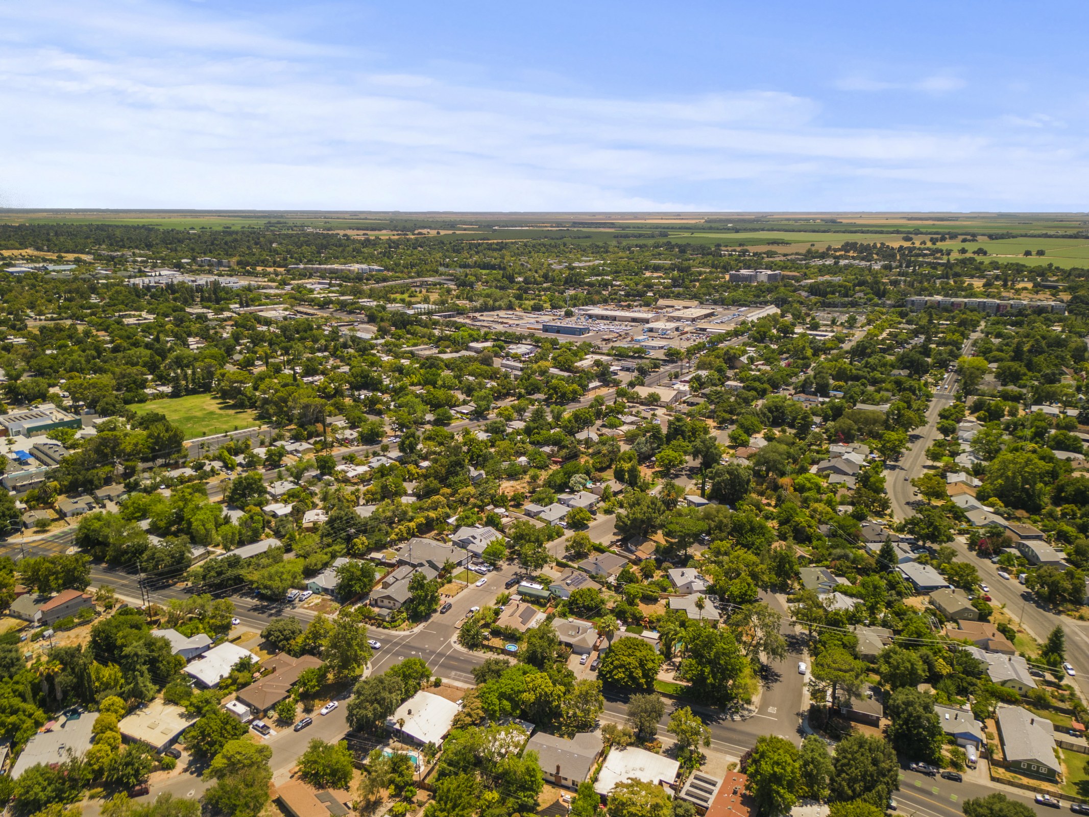 Aerial view of the home and surrounding neighborhood
