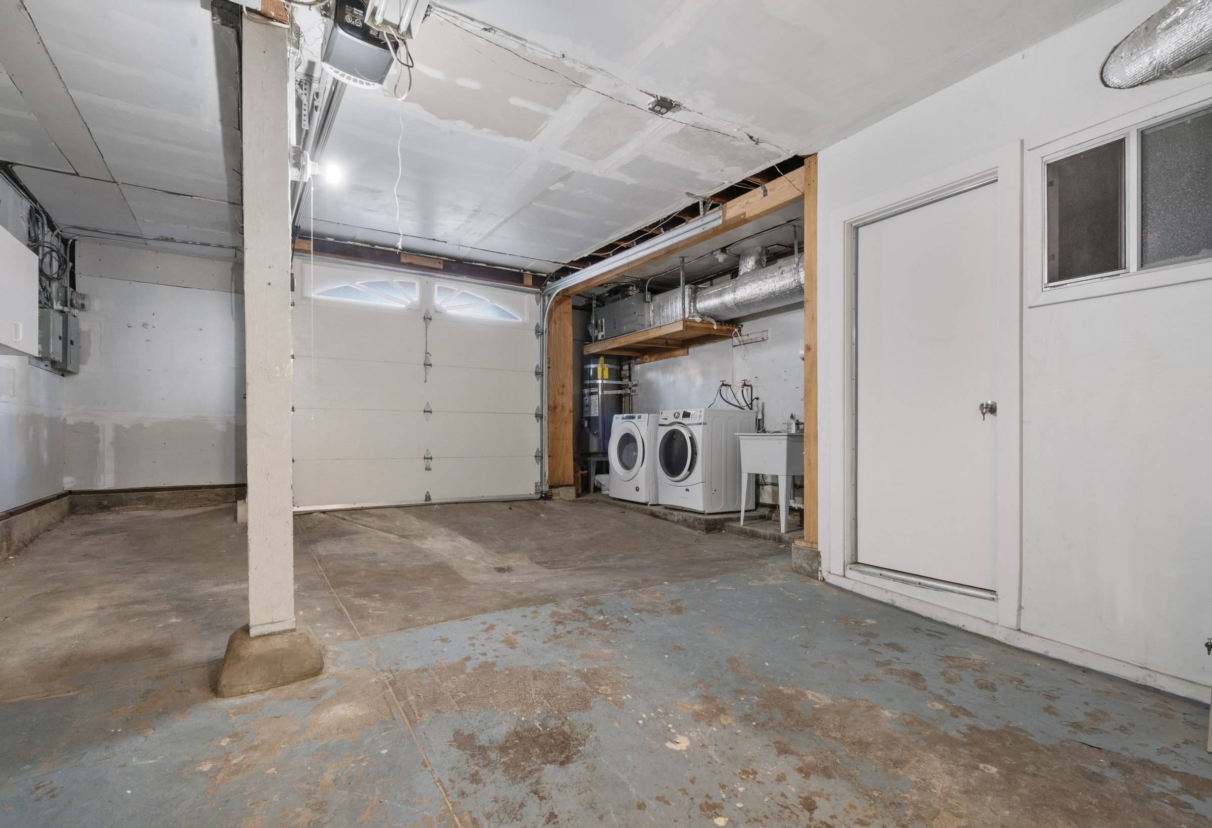 Garage interior with laundry appliances pictured