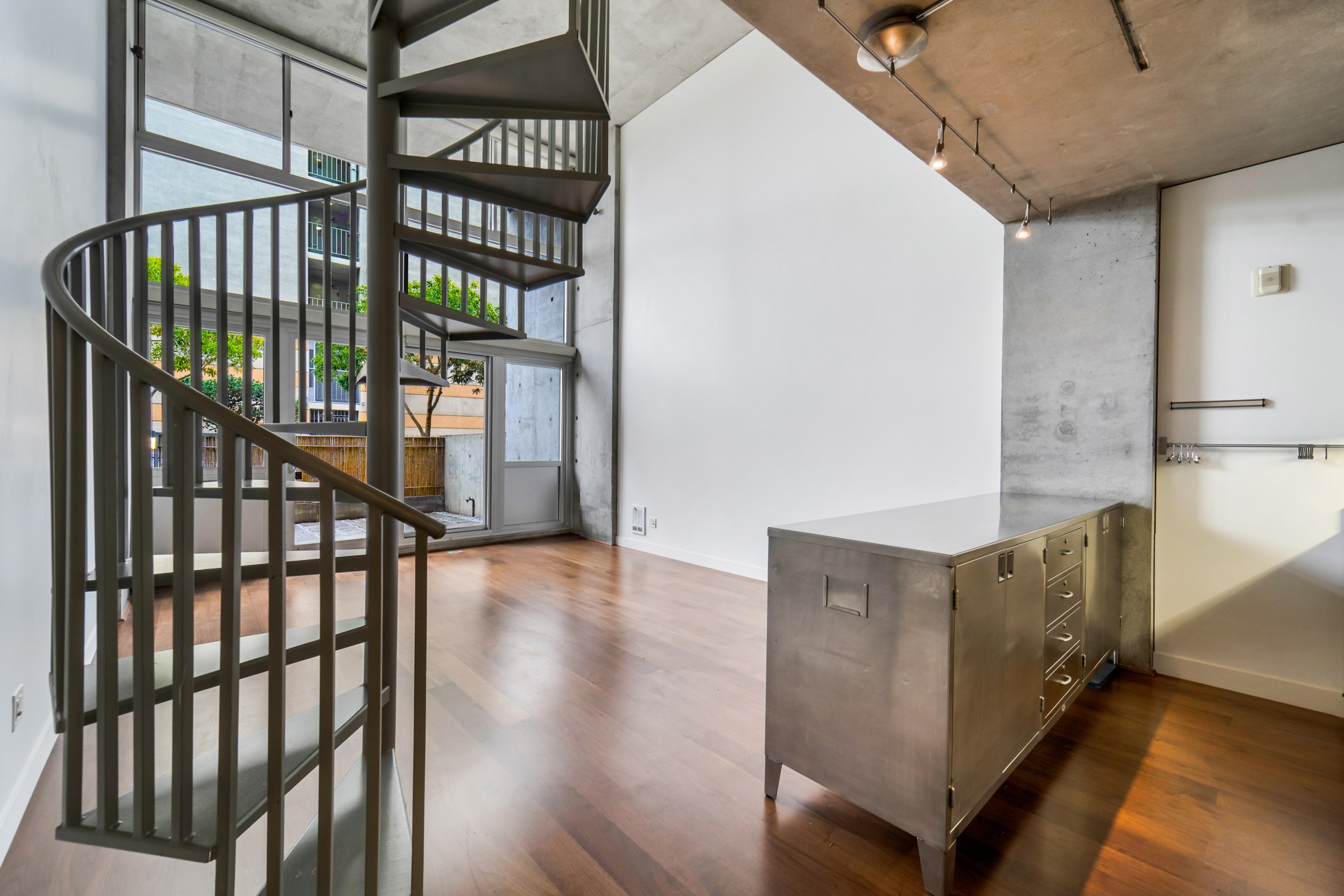 Spiral staircase and exposed concrete