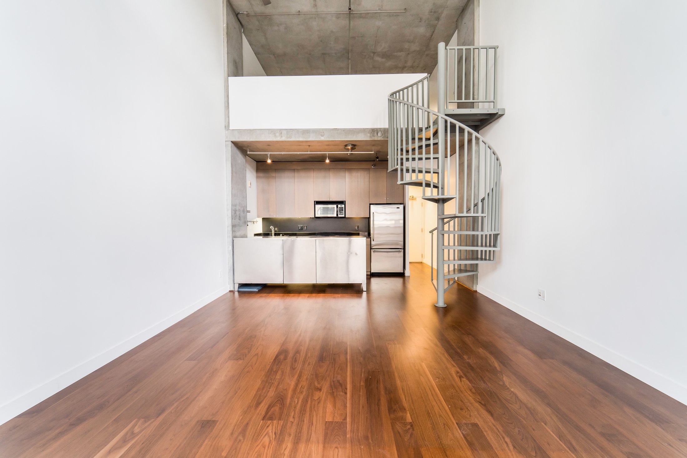 Open living room with wood flooring