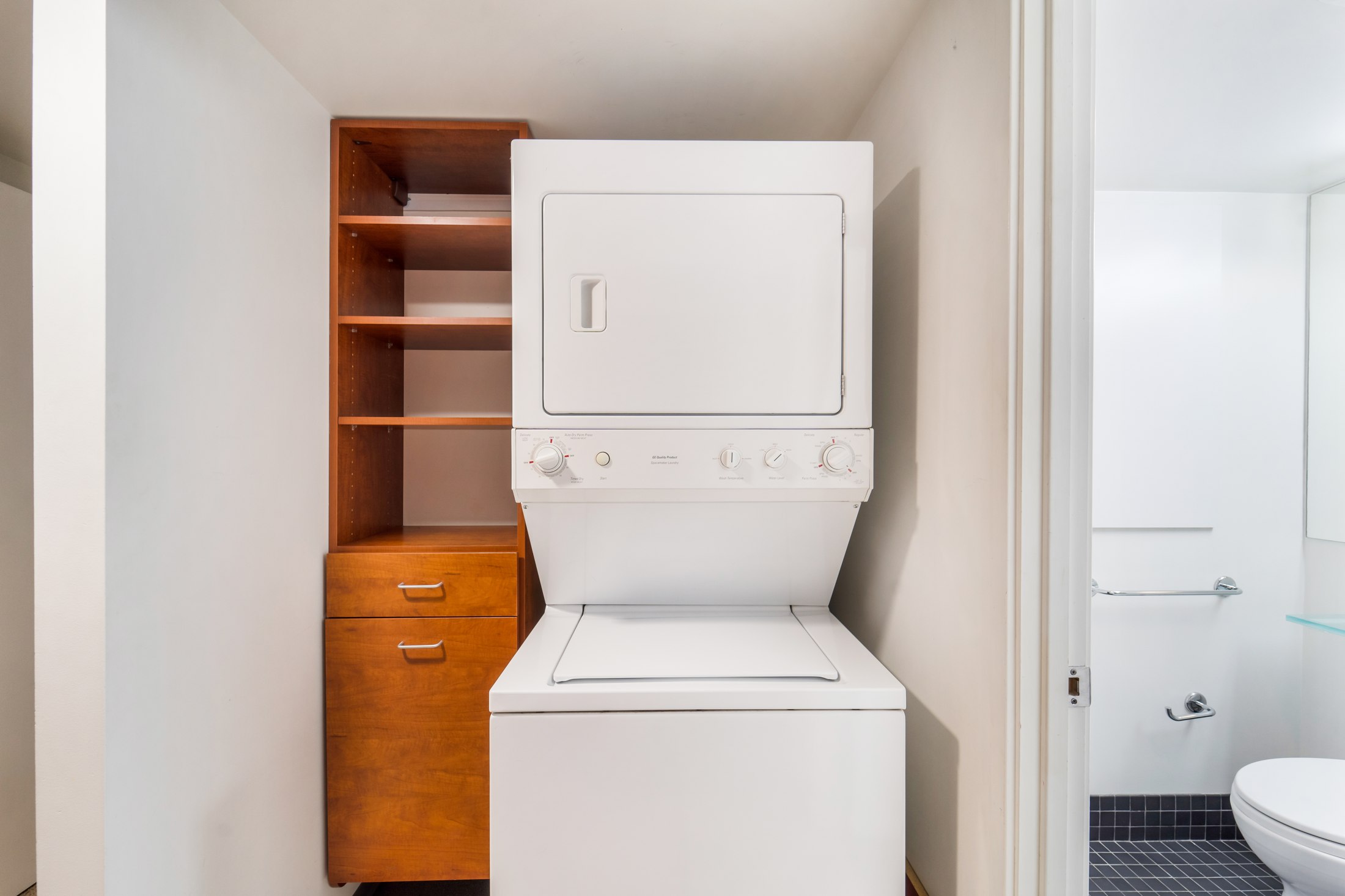 Stacked in-unit washer and dryer