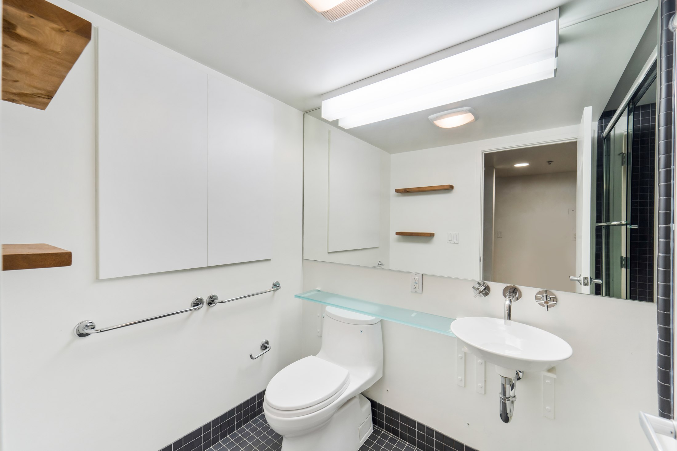 Bathroom vanity and toilet
